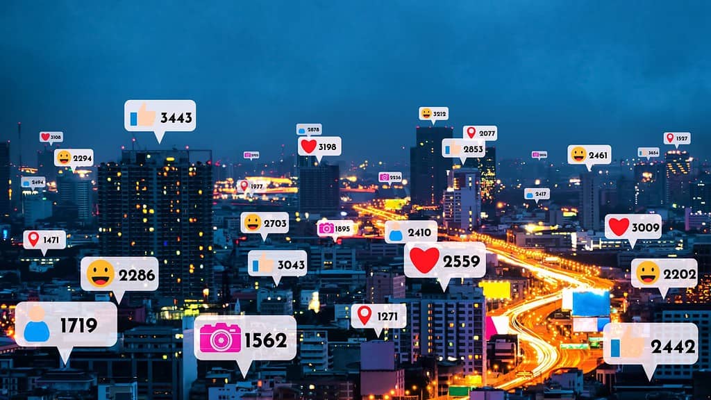 a stylized representation of social interactions, where there is a nighttime city scape with bubbles with hearts and numbers popping up all over to indicate social media activity in the buildings